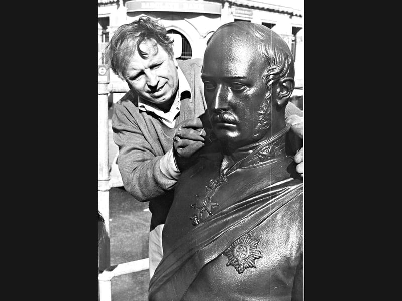 Restorer Harry Blades works carefully from scaffolding to apply a protective coat of paint to the statue of Prince Albert in Queen Square, Wolverhampton, in March 1982. Commissioned by Wolverhampton Council to shield the historic bronze from corrosion, the restoration project also saw thorough clean-ups for the statue of Lady Wulfruna on St Peter's steps and the sailor boy statue in St Peter's Gardens. Do you remember seeing Prince Albert surrounded by scaffolding and being polished up in Queen Square back in the spring of 1982?