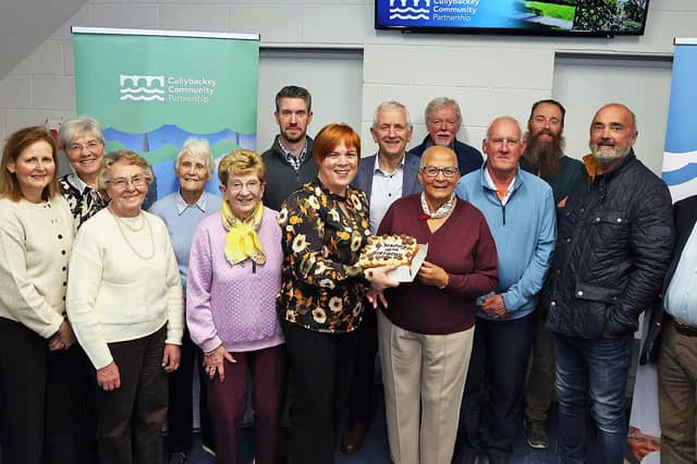 Members of Cullybackey Community Partnership celebrating their 10th birthday in the Maine Business Centre. GB4444 JK26