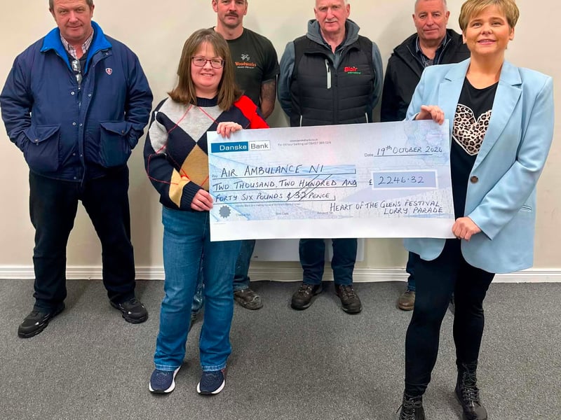 A cheque being presented to Air Ambulance NI following the Heart of the Glens lorry parade