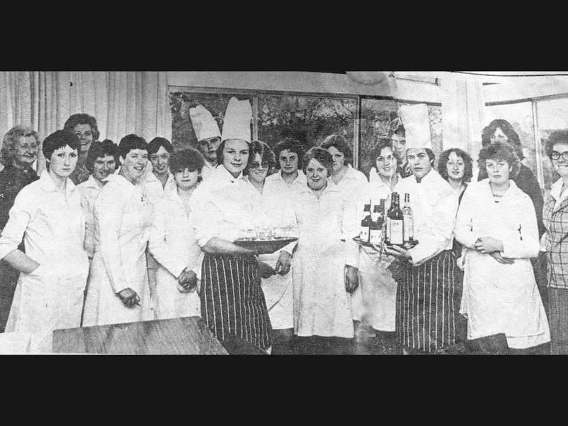Staff and students from Shrewsbury’s Radbrook Centre balance trays of glasses and wine bottles between 1977 and 1979 as they practice their hospitality skills ahead of an educational tour of the Loire and Bordeaux vineyards, with trainee chefs Kevin Skeet, Colin Pound, and Jeremy Blakely joined by classmates Sue Kelly, Tina Hughes, and Julie Upton. Did you study catering or domestic science at Radbrook College during that period between 1977 and 1979? Were you part of this memorable vineyard study trip or do you recognise any of your former classmates in the line-up?