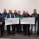 Members of Glens Vintage Club present a cheque to NI Air Ambulance