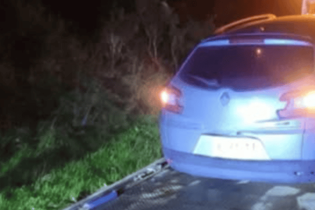 The speeding car being towed away after its seizure