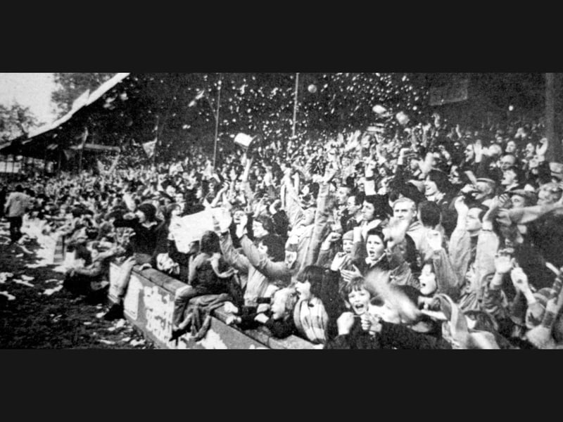Streamers and shredded paper rain down from the packed terraces on Thursday, May 17, 1979, creating an electric atmosphere as supporters celebrate an emphatic four-one victory over Exeter City that secured the Third Division championship and historic promotion into Division Two for the very first time. Did you bring along rolls of paper or torn-up newspapers to throw from the stands on that unforgettable night? Where in the ground were you standing when the final whistle blew to confirm Shrewsbury Town were champions?