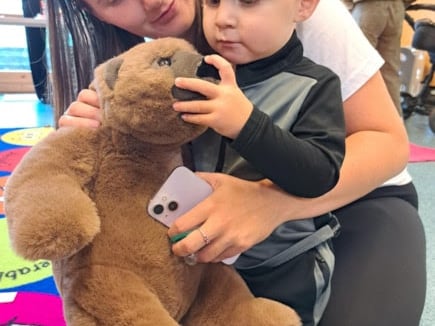 "It has helped Arlo to develop and to get speaking, and it's great to see him mingling with other kids of his age."