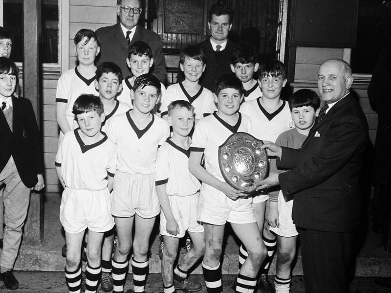 St David's Primary School's football team being presented with Leith School's Cup in March, 1964.