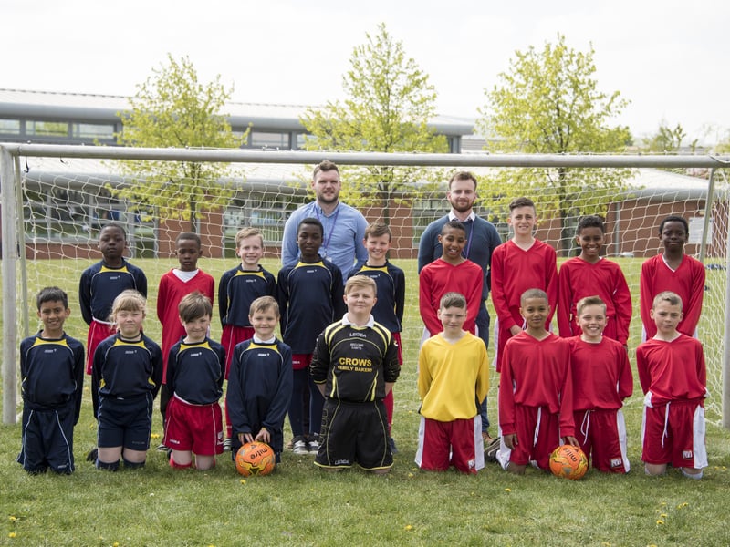The St Joesph's RC Primary School football team in May, 2017 with coaches Mr Crowley and Mr Murphy at the Broomhouse Campus.