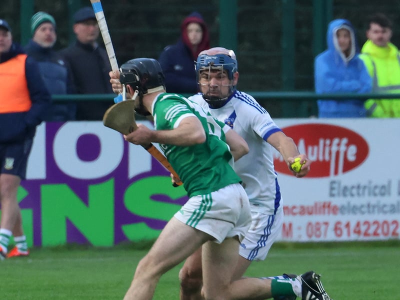 Michael Lane in possession for Bruree against Knockaderry's Jack Molloy
