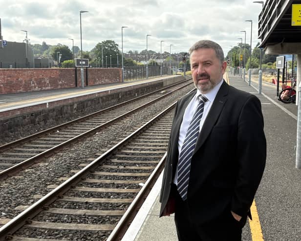 Robin Swann at Antrim station