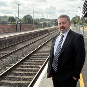 Robin Swann at Antrim station