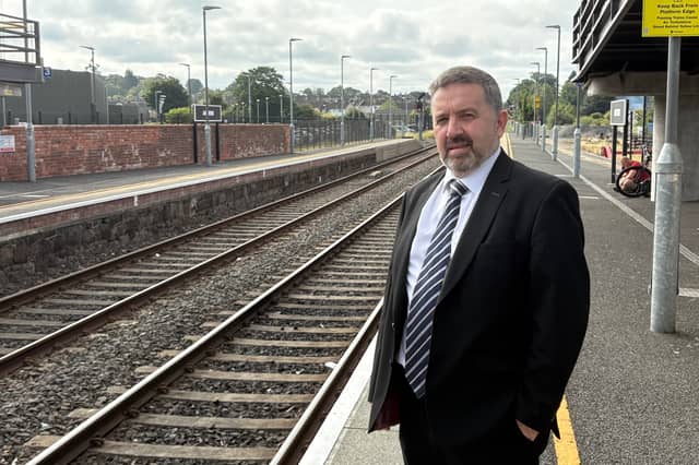 Robin Swann at Antrim station