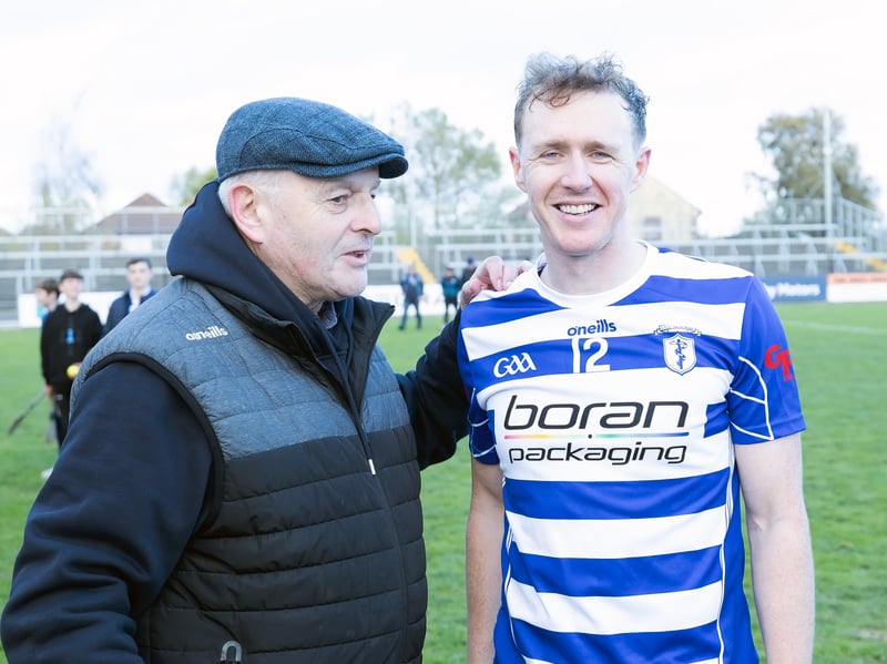 Naas Brian Byrne is congratulated by Naas Michael Sheridan