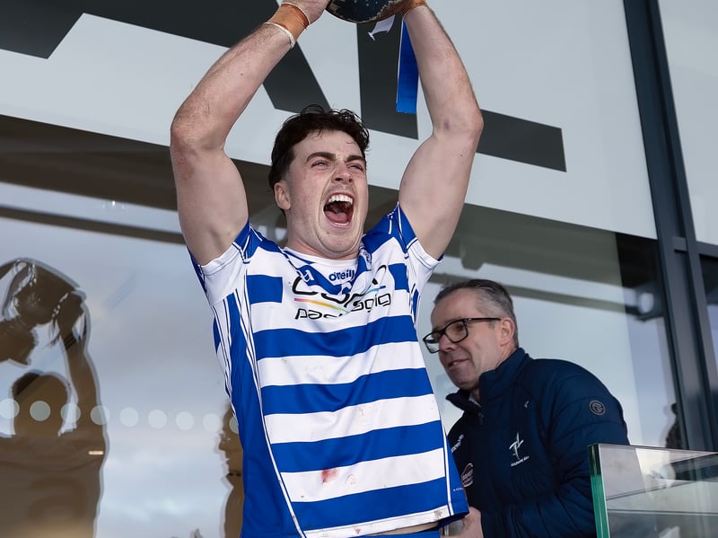 Naas Captain Conal Boran holds aloft the Tony Carew Cup for the Senior Hurling Championship