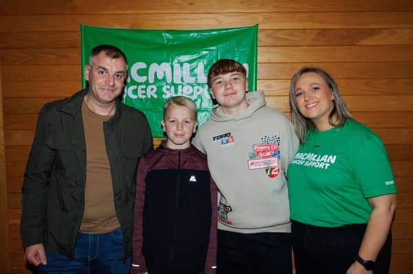 William, Dawson, Jenson and Andrena Moore attending the fundraising night in Bready Cricket Club in aid of Macmillan Cancer Support.JC4420CM26 