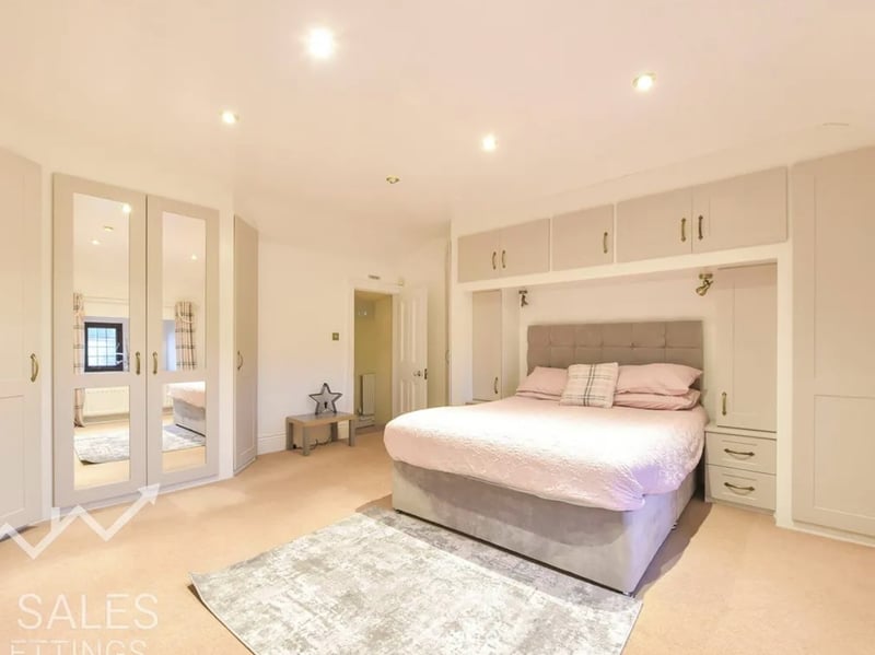 Each of the bedrooms in the farmhouse has its own style.