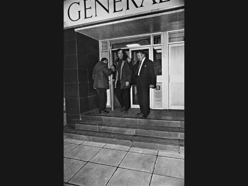 TGWU regional secretary Brian Mathers (right) ushers shop stewards down the steps of Transport House in West Bromwich after marathon late-night talks in December 1976. The six-hour summit hammered out a proposed peace formula to settle a bitter strike by 120 maintenance engineers at the giant Rubery Owen car components plant in Darlaston, who had walked out over a £10 weekly pay claim and threatened to stall the wider British motor industry. Were you employed at Rubery Owen in Darlaston or caught up in the widespread automotive disputes across the region during the winter of 1976?