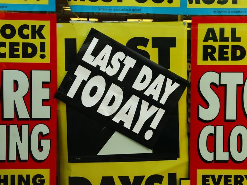 Signs in the windows on Woolworths last day in Preston.