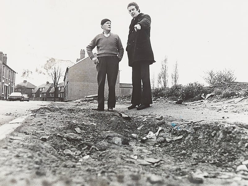 Council candidate Denzil Marston points out the hazardous, broken footpath alongside a resident on Stour Street, Greets Green, in April 1976. Describing the 50-yard stretch of uneven rubble as resembling an obstacle track after witnessing a passer-by stumble and fall, Mr Marston pledged to take neighbourhood complaints directly to Sandwell Council to press for urgent repairs. Did you live around Stour Street or remember navigating the bumpy pavements of Greets Green during the spring of 1976?