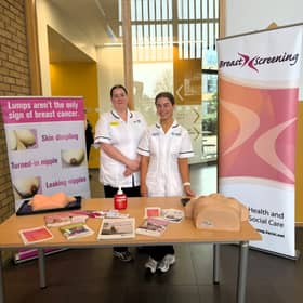 Emma and Ciara from the Western Trust Breast Team are pictured at an information stand at Altnagelvin Hospital this week to support Breast Cancer Awareness Month.
