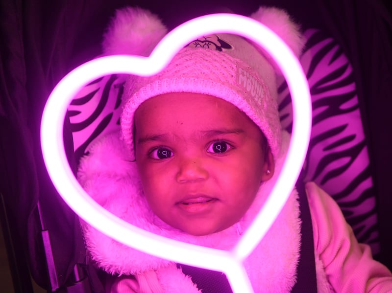 1-year-old Tara Govindgari enjoying the lights.