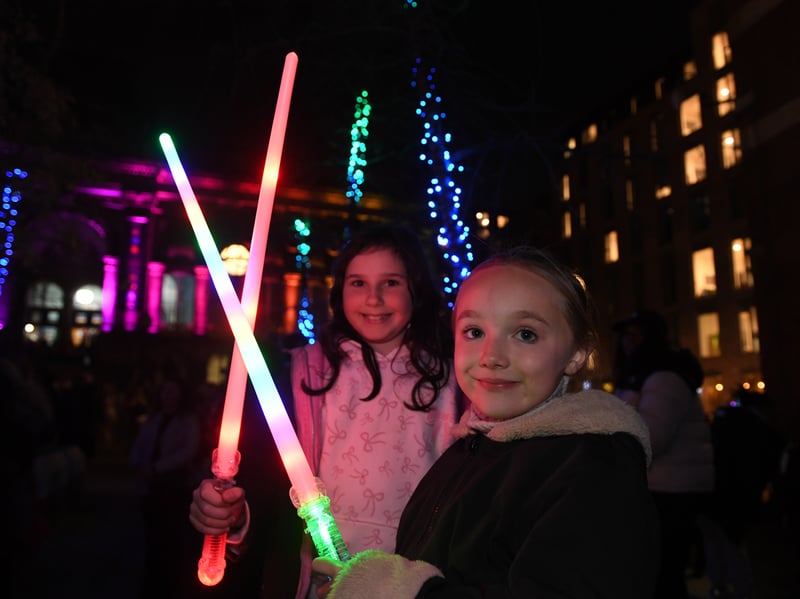 Romie Lee, 10 and Georgia Slater, 9, from Leeds with lightsabres.
