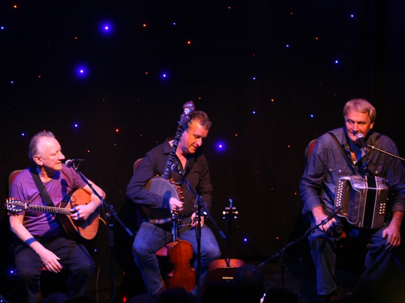 Dónal Lunny with John Carty, and the late Seamus Begley, performing in The Bush Hotel.