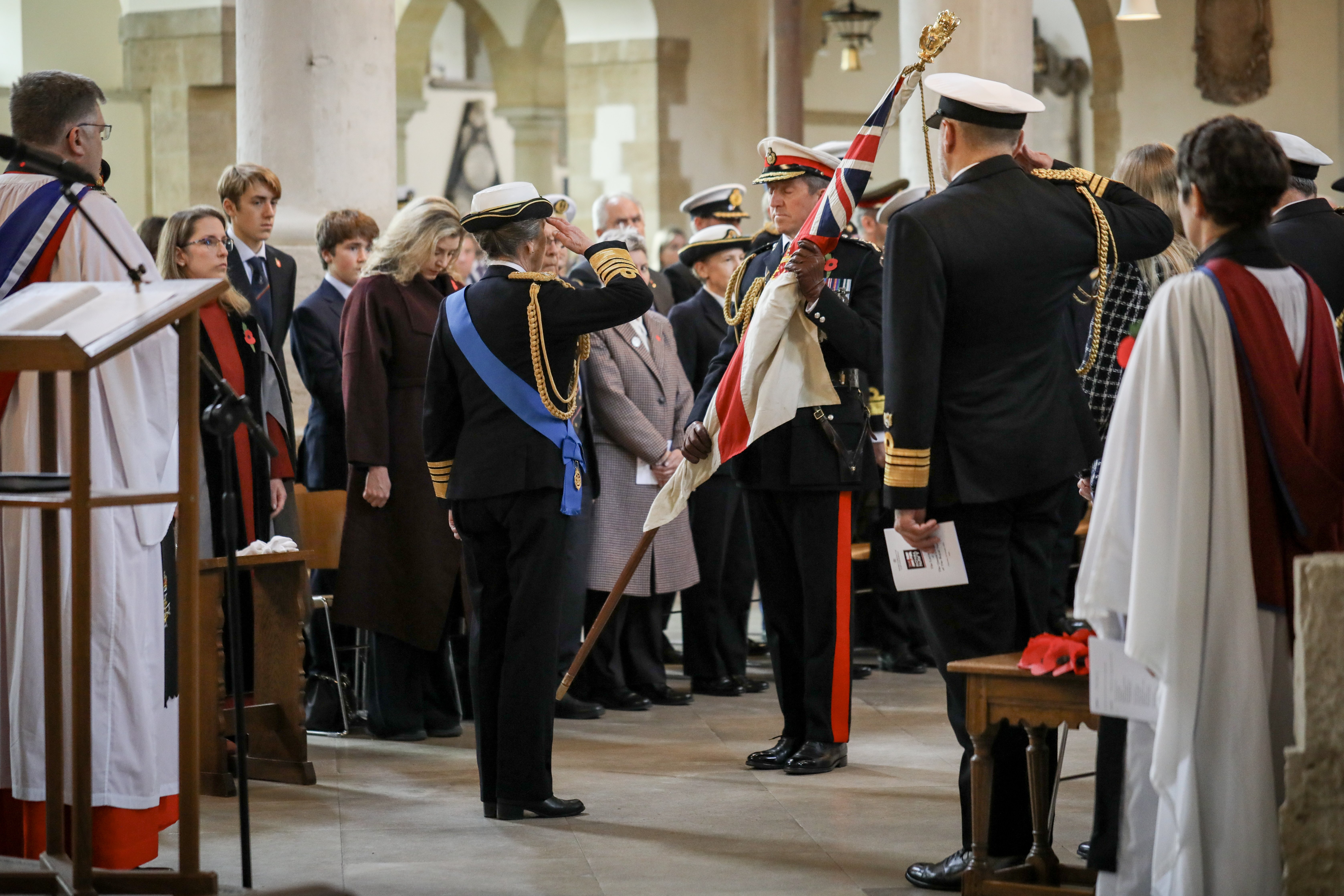 Princess Anne visited Portsmouth Cathedral for the Laying Up of the Queen's Colours on October 29, 2026.. This honoured the late Queen Elizabeth II.  Pictured: Handing over of the Queen's colours by First Sea Lord Sir Gwyn Jenkins to HRH Princess Royal