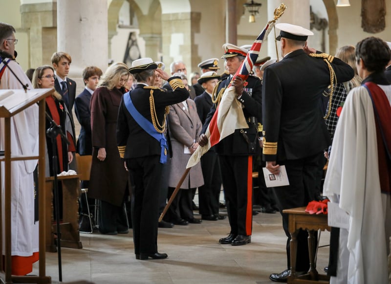 Princess Anne visited Portsmouth Cathedral for the Laying Up of the Queen's Colours on October 29, 2026.. This honoured the late Queen Elizabeth II.  Pictured: Handing over of the Queen's colours by First Sea Lord Sir Gwyn Jenkins to HRH Princess Royal