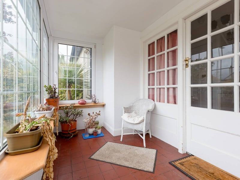 The entrance porch provides a welcoming introduction to the property, leading into the hall, which has a useful under stair storage cupboard.