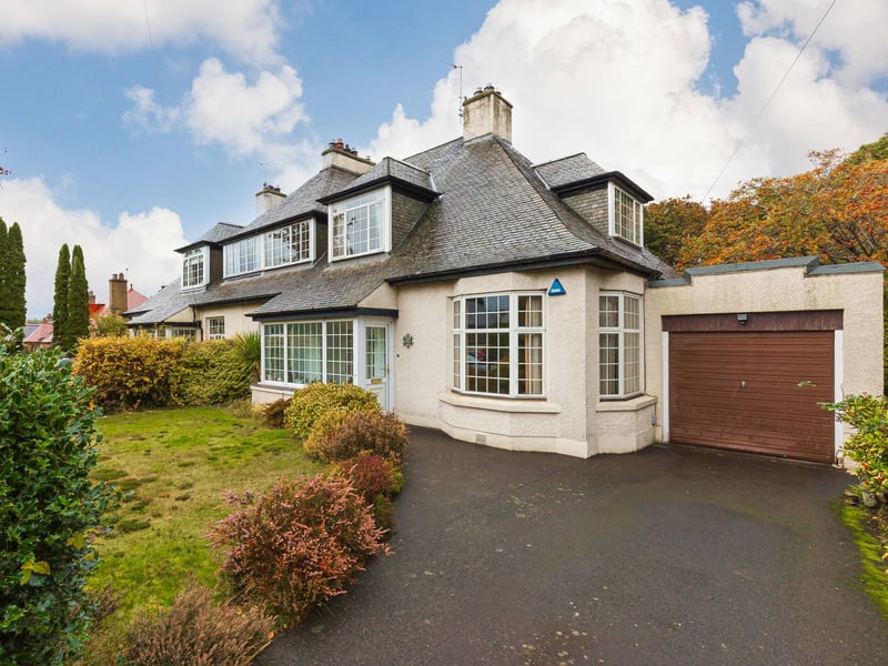 Set in coveted Colinton, this spacious four-bedroom property is packed with potential to be an incredible family home, with a stunning garden.