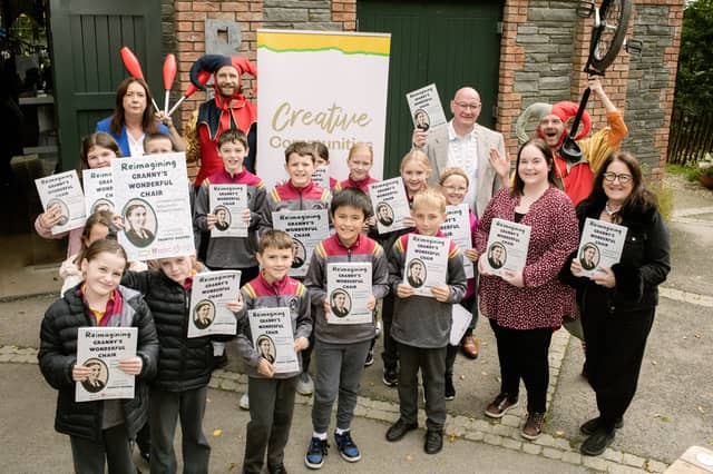 Pupils from Raphoe Central National School proudly display copies of 'Reimagining Granny’s Wonderful Chair'. The pupils worked alongside writer, Isla McGuckin, to explore Browne’s fairy tales and create their own original story, 'The Magic of Feetville', which features in the publication. Also pictured are Leas-Chathaoirleach of Donegal County Council, councillor Terry Crossan, senior executive librarian, Donna Cavanagh, executive librarian, Sinead Noonan and chairperson of the Frances Browne Literary Festival, Celine McGlynn.