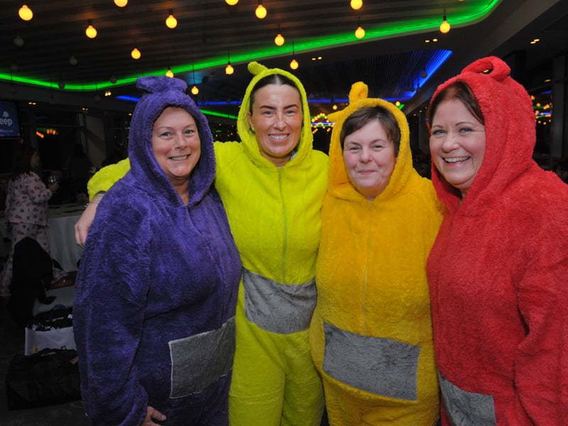 Debbie Powell, Paige Probert, Joanne McManus, and Sandra Dyson, of Caddick Construction, sporting Teletubbies outfits for the sleep