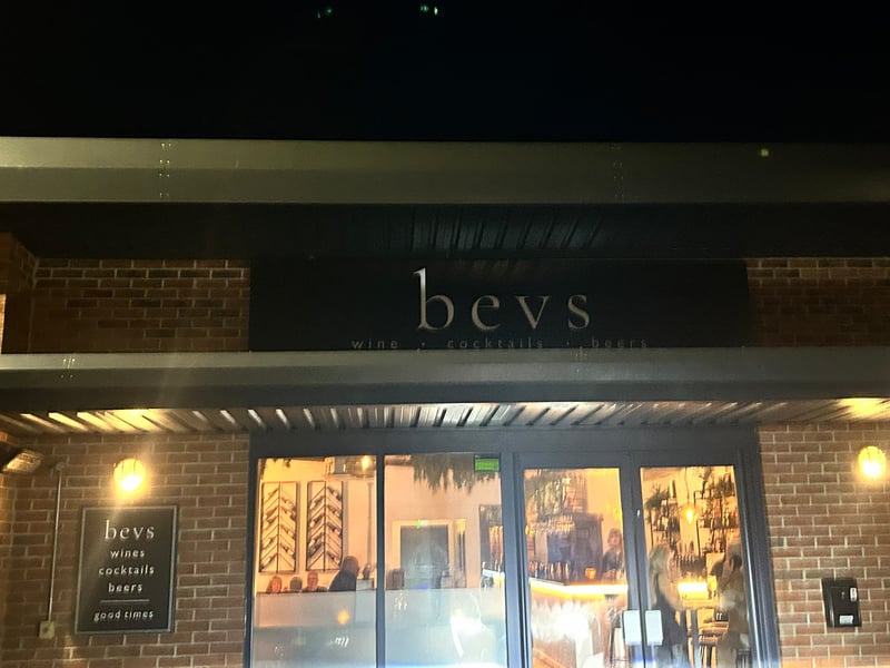 The outside of the bar features a large sign.