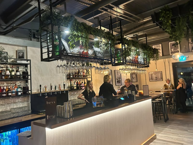 A custom built bar has been installed. 