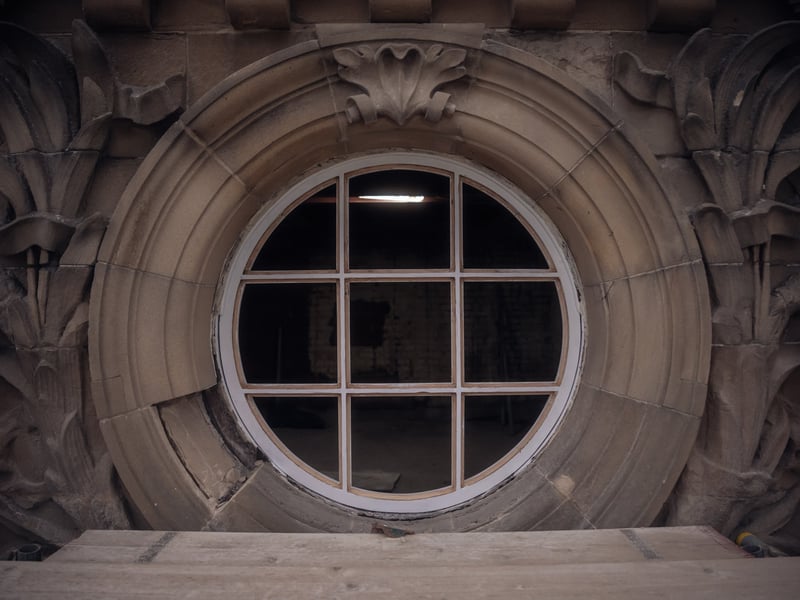 One of the building's iconic circular windows