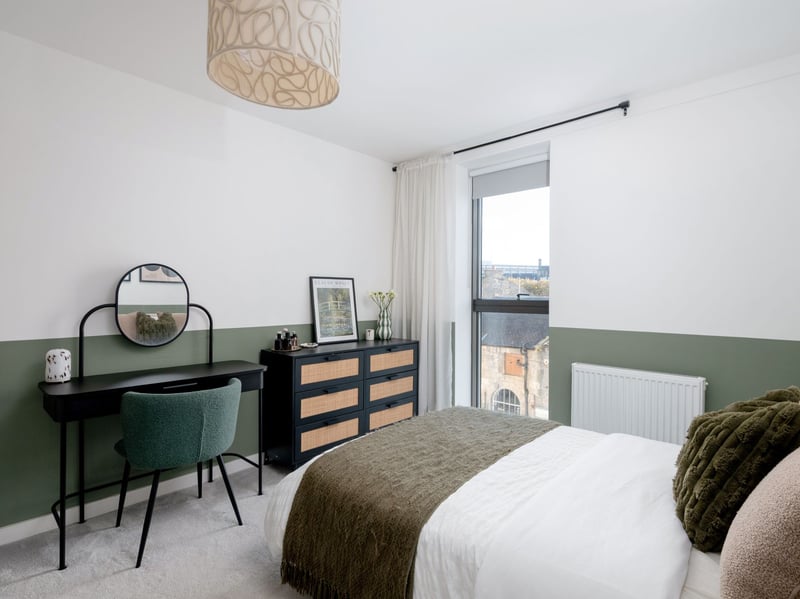 There are two comfortable south-facing double bedrooms, both with fitted wardrobes, and one with access to a smart balcony.