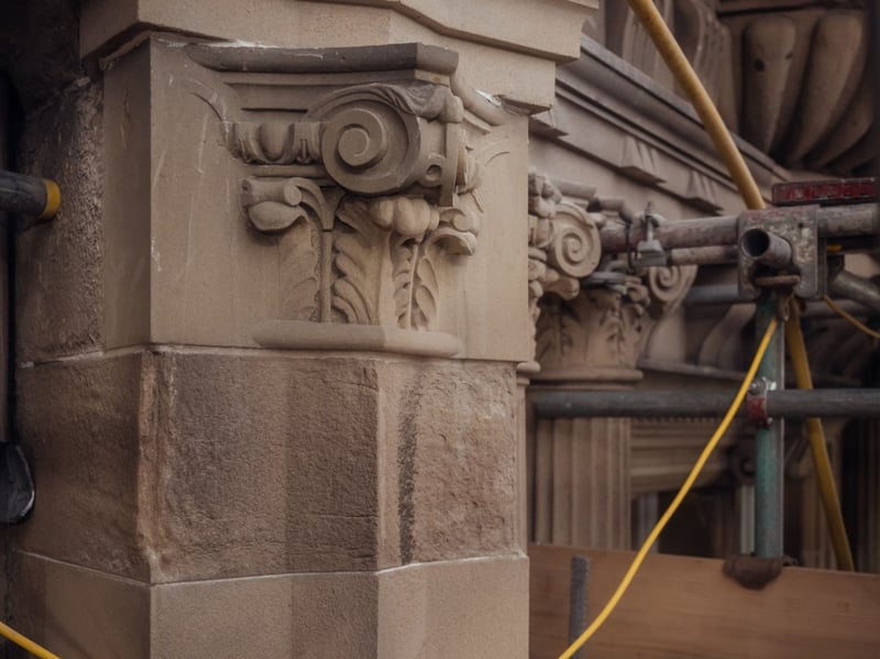 Highly skilled stonemasons have been working on restoring the intricate details of the building's walls 