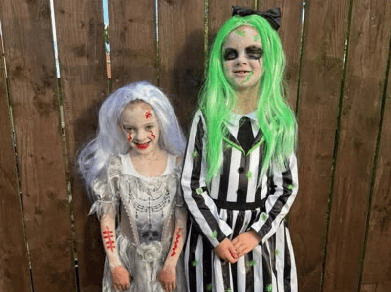 Mikaylah, aged five, as a dead bride and Lexi-Rae, aged six, as Beetlejuice.