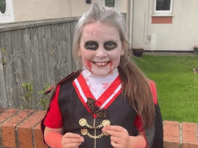 Evie as Count Dracula.