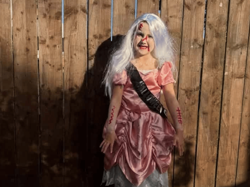 Five-year-old Amara-Jo has dressed up as a dead bride.