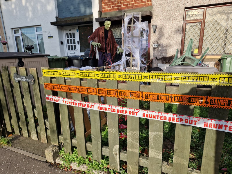 A giant Frankenstein watches over this spooky Longstone garden this Halloween.