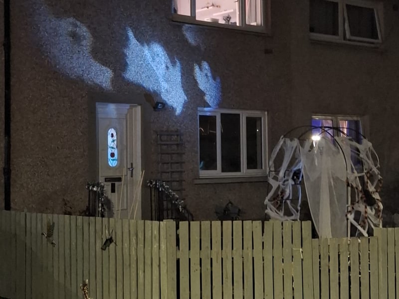 This home in Danderhall has been lit-up with ghosts, with spooky spiders and webs in the garden.