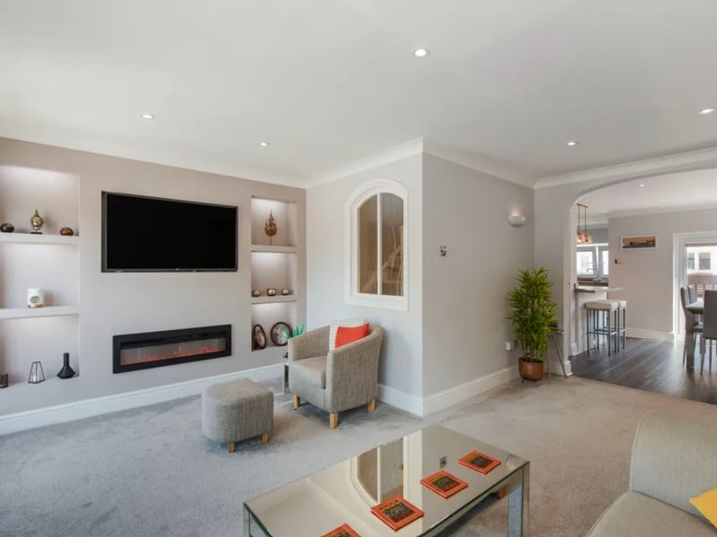 Inside this three bedroom town house that overlooks the historic Hot Walls.