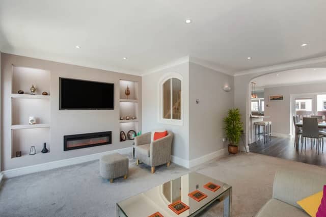 Inside this three bedroom town house that overlooks the historic Hot Walls.