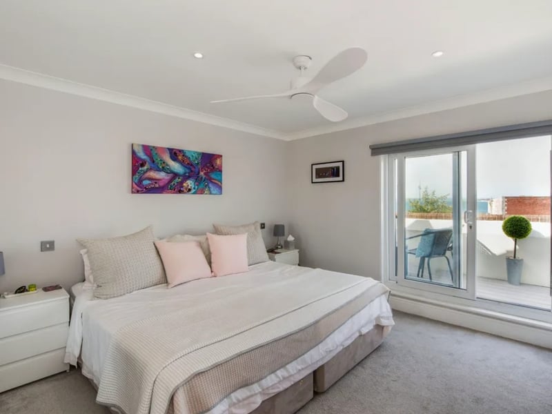 Inside this three bedroom town house that overlooks the historic Hot Walls.