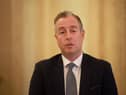 Education Minister Paul Givan speaking to the media at Parliament Buildings, Stormont in Belfast, after over 150 schools in Northern Ireland received bomb threats which are not being treated as viable. Picture date: Monday October 19, 2026. PA Photo. 
