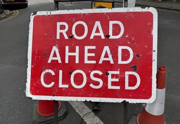 Road closed sign