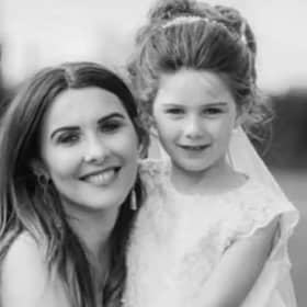 Caitlin-Rose McMullan, who died after getting off a school bus in 2025 (pictured with mother Stella).