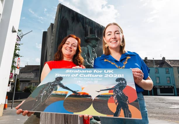Derry City and Strabane District Council Mayor Grace Uí Niallais pictured with Deirdre Harte, DC&SDC Project Officer, unveiling the new branding for the Strabane Town of Culture bid.